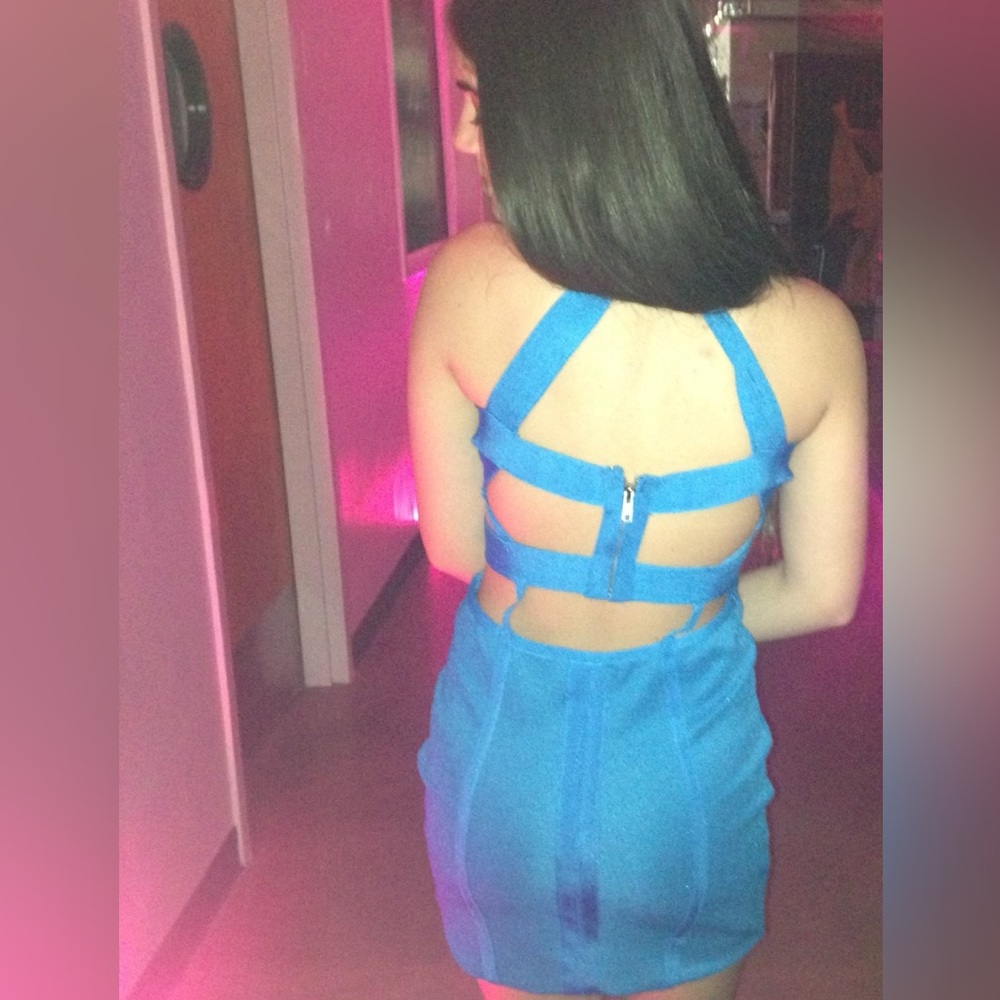 Blue bandage dress with a fun cut-out back!